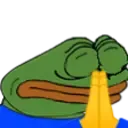 Froschfigur mit geschlossenen Augen hält die Hände betend vor das Gesicht, trägt ein blaues Shirt.